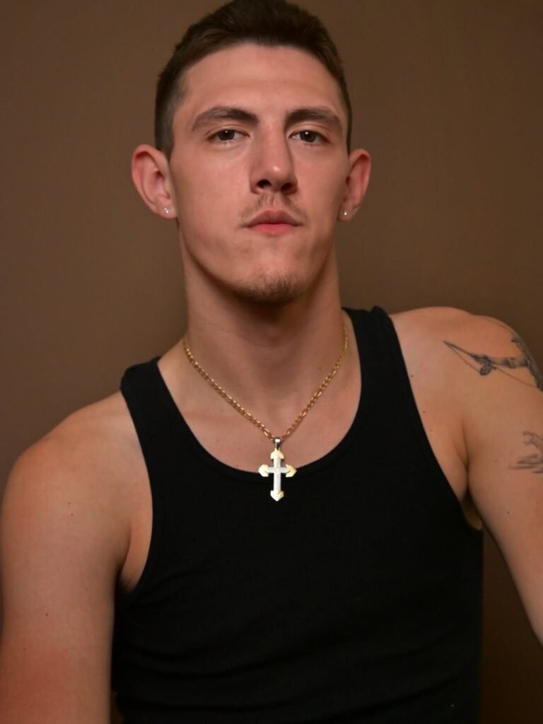 Headshot of Dilian Cantrell on a brown backdrop